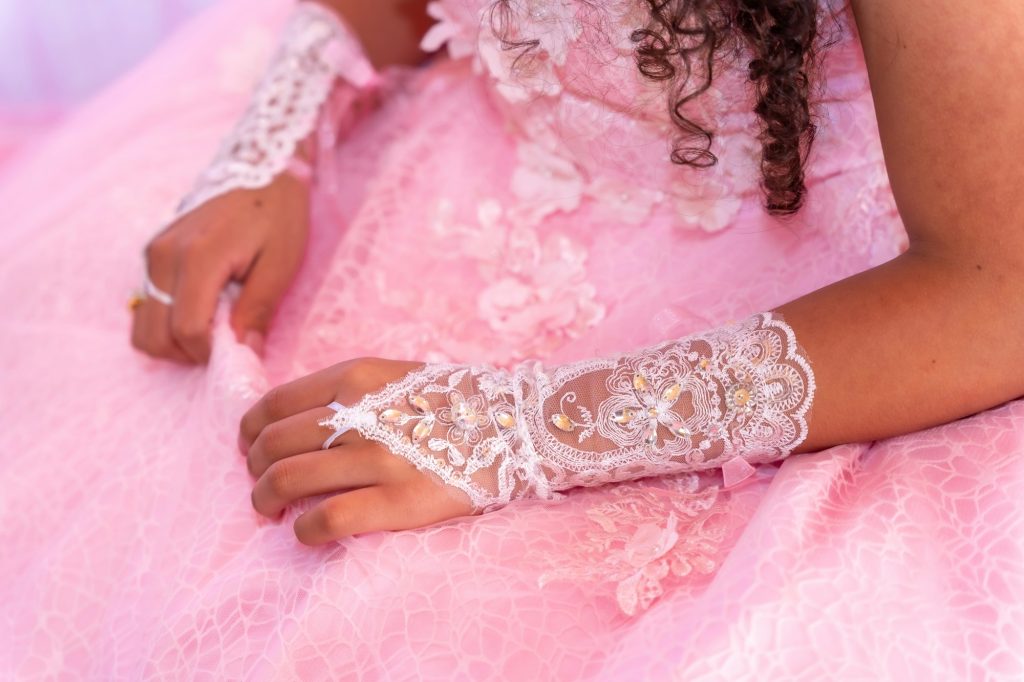 Details of the girl's outfit on her 15th birthday, a traditional Latin American and Spanish party